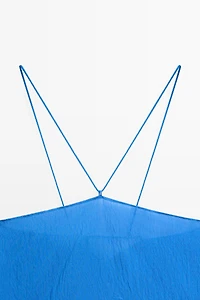 Flowing halter top with tie detail