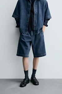 PLEATED RELAXED FIT DENIM SHORTS