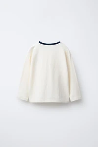 T-SHIRT VARSITY OURS BRODÉ