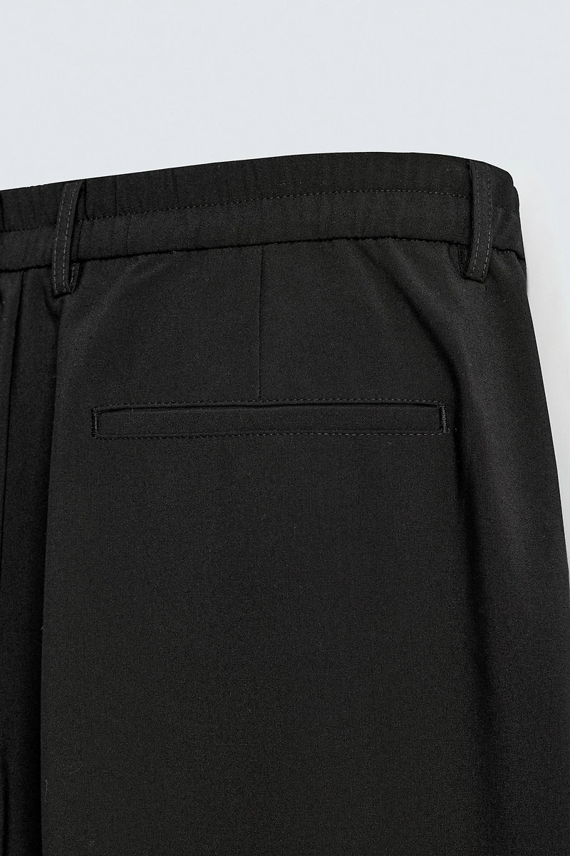 PLEATED WIDE FIT PANTS