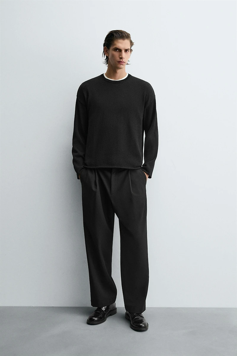 TEXTURED KNIT SWEATER WITH ROLLED TRIM
