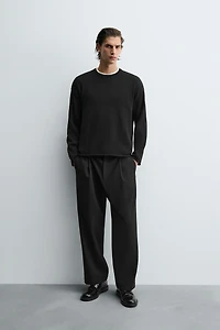 TEXTURED KNIT SWEATER WITH ROLLED TRIM