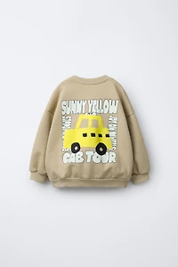 TAXI PRINT SWEATSHIRT