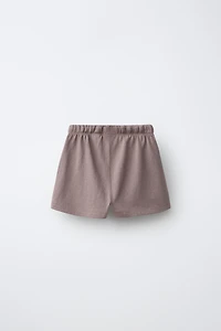 SHORT OVERSIZE SURPIQÛRES