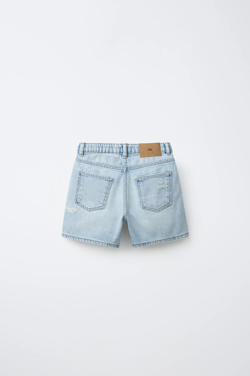 BERMUDA EN JEAN BAGGY DÉCHIRÉ