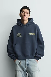 WASHED PRINTED TEXT SWEATSHIRT