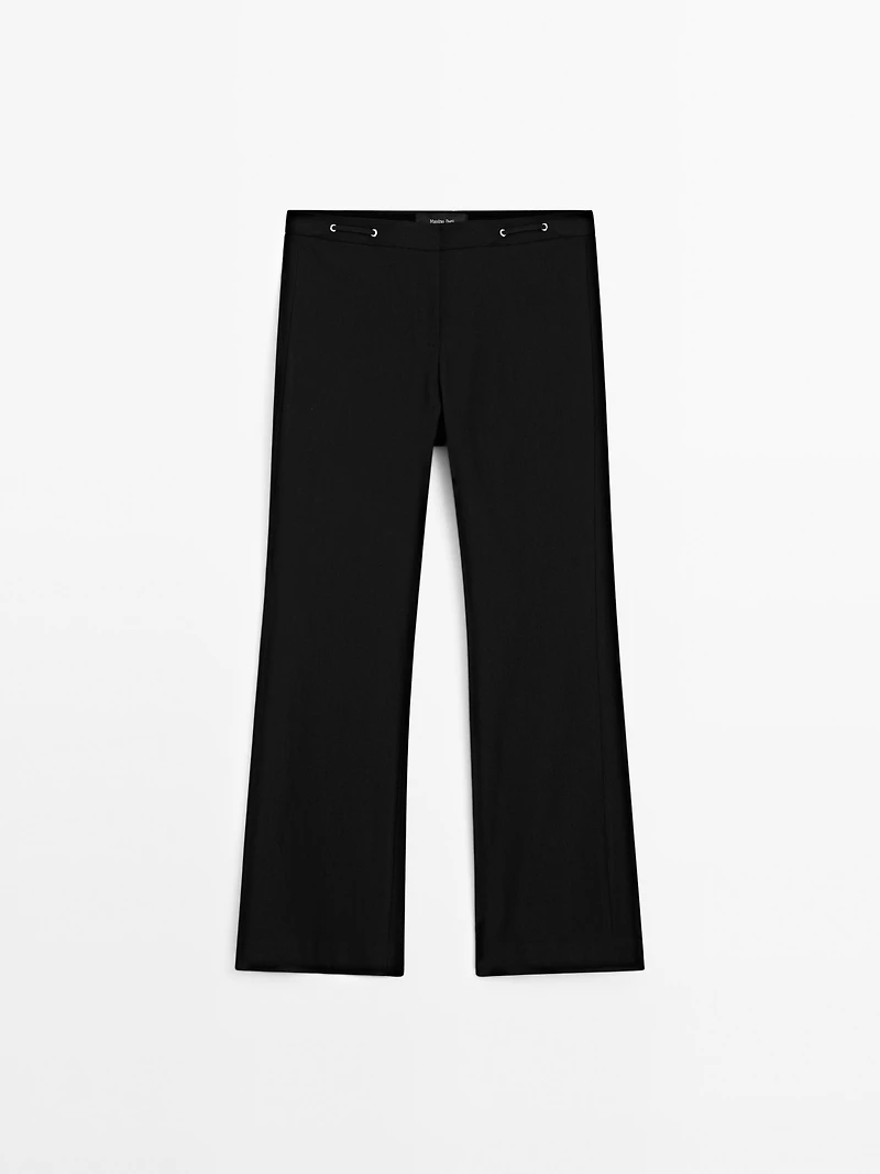Flared trousers with waist detail