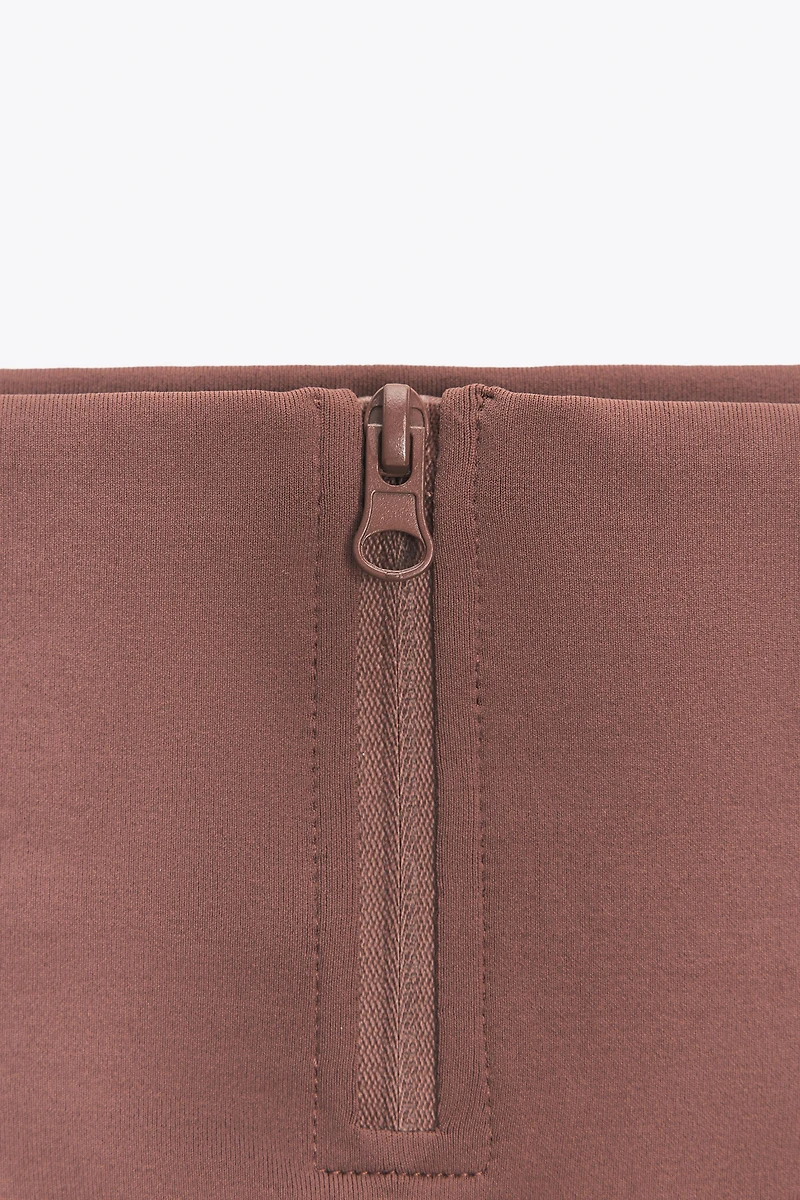 SEAMLESS ZIPPERED LEGGINGS