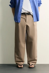 RELAXED FIT PLEATED PANTS