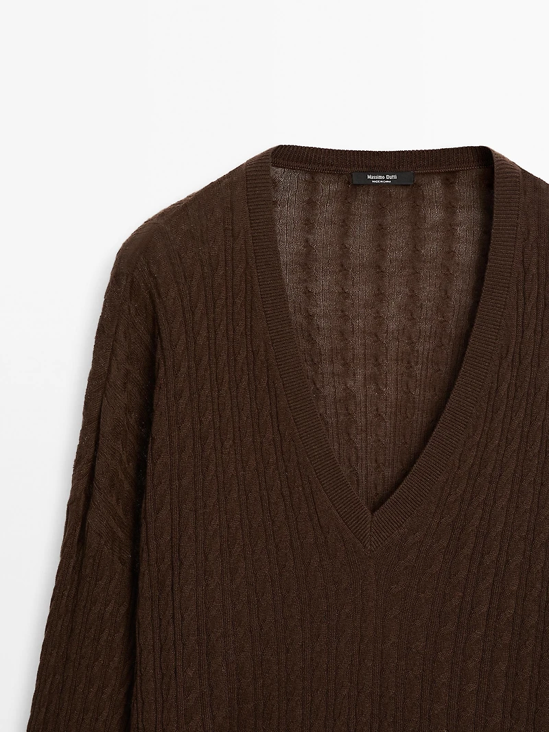 V-neck cable-knit sweater