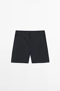 Plain swimming trunks with waist detail