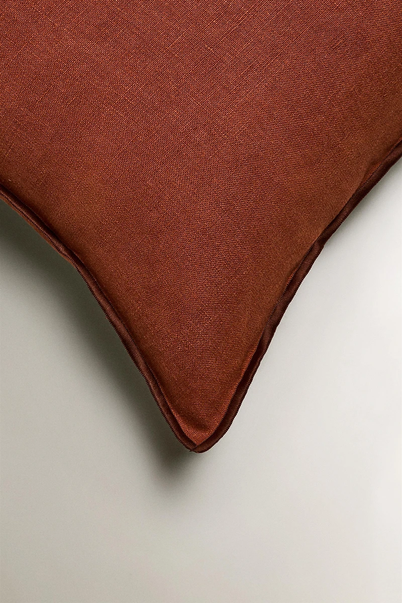 HOUSSE DE COUSSIN OVERLOCK