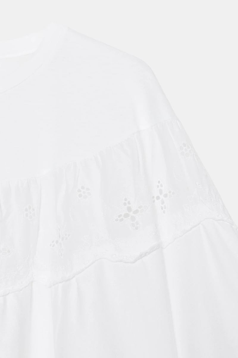 EMBROIDERED CAPE TOP