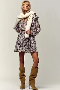 BOTTES À TALONS EN CROÛTE DE CUIR