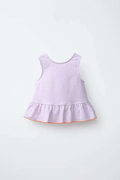 STRIPED PEPLUM TOP WITH CONTRAST LACE