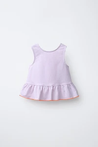 STRIPED PEPLUM TOP WITH CONTRAST LACE