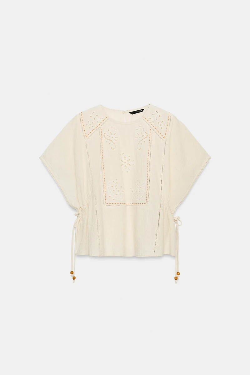 EMBROIDERED TOP WITH SIDE LACING