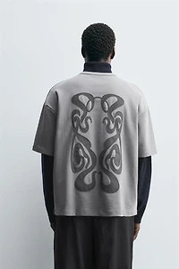 T-SHIRT À PIÈCE BIMATIÈRE