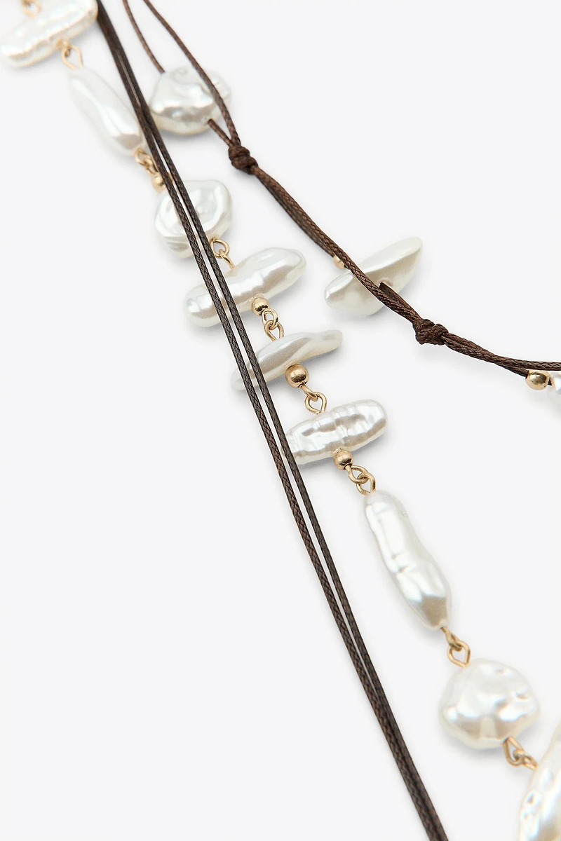2-PACK PEARL SHELL BELTS