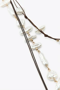 2-PACK PEARL SHELL BELTS