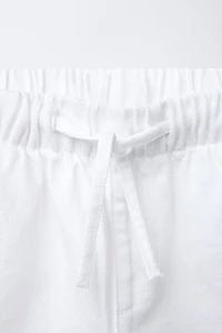 BERMUDA EN DENIM ÉLASTIQUE