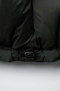 DOUDOUNE EN PLUME ET DUVET DÉPERLANTE AVEC ÉTIQUETTE