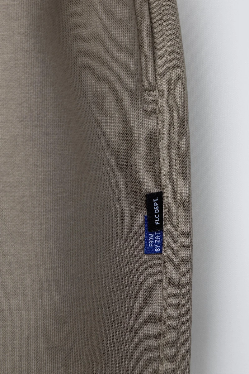 BALLOON PLUSH PANTS WITH TEXT