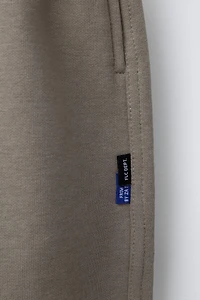BALLOON PLUSH PANTS WITH TEXT
