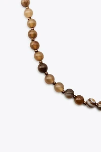 COLLIER BOULES PIERRES