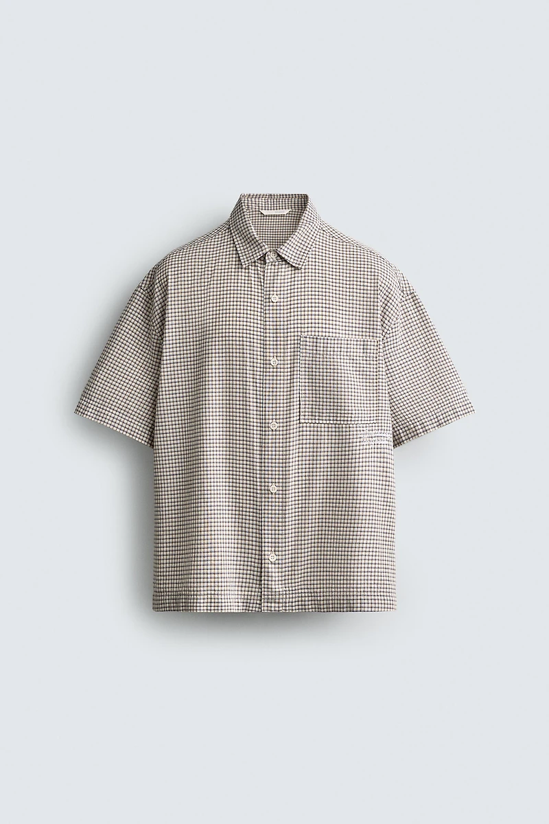 RELAXED FIT PLAID TEXT SHIRT