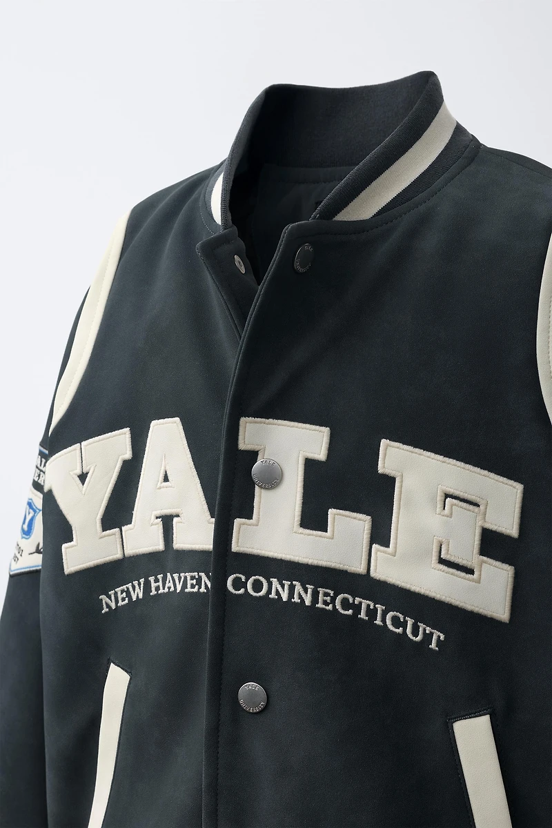 BLOUSON BOMBER EN MATIÈRE SYNTHÉTIQUE IMPRIMÉ YALE UNIVERSITY ™