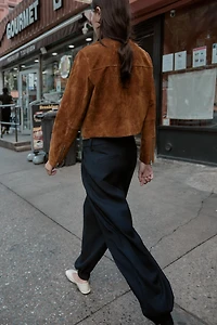 PLEATED PANTS WITH BUTTONED HEM