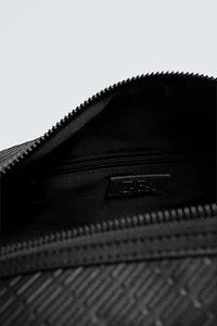 TEXTURED RUBBERIZED CROSSBODY BAG