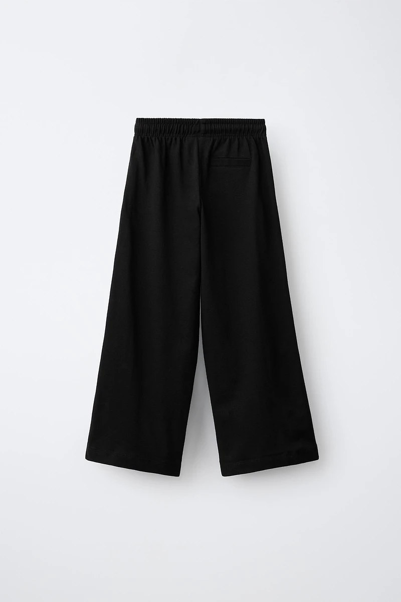 WIDE LEG PANTS WITH SIDE STRIPES