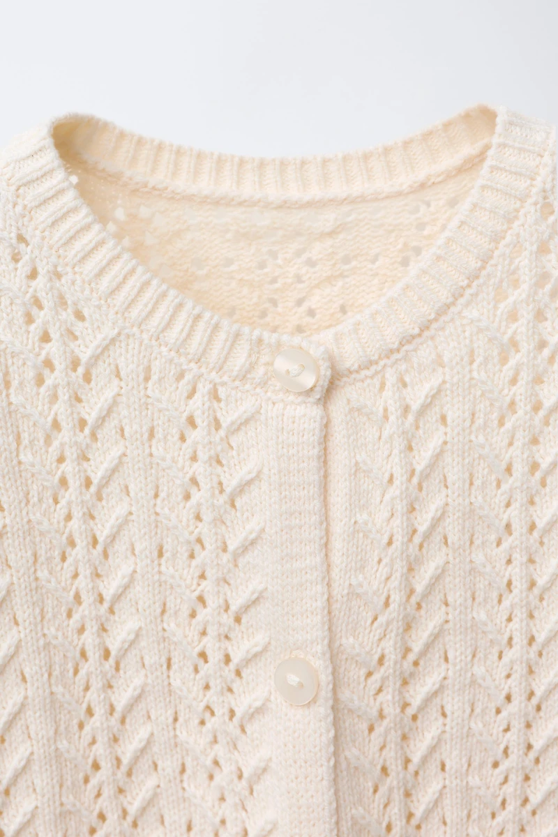 GILET EN MAILLE ROMANTIQUE