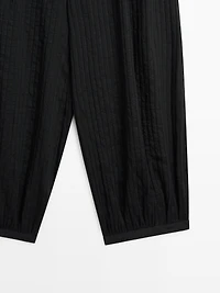 Flowing linen-blend drop crotch pants