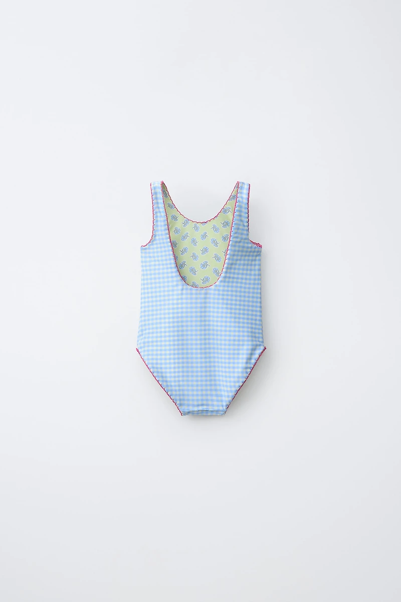MAILLOT DE BAIN RÉVERSIBLE FLEURS ET CARREAUX (2-6 ANS)