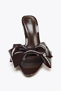 BOW HEELED SANDALS