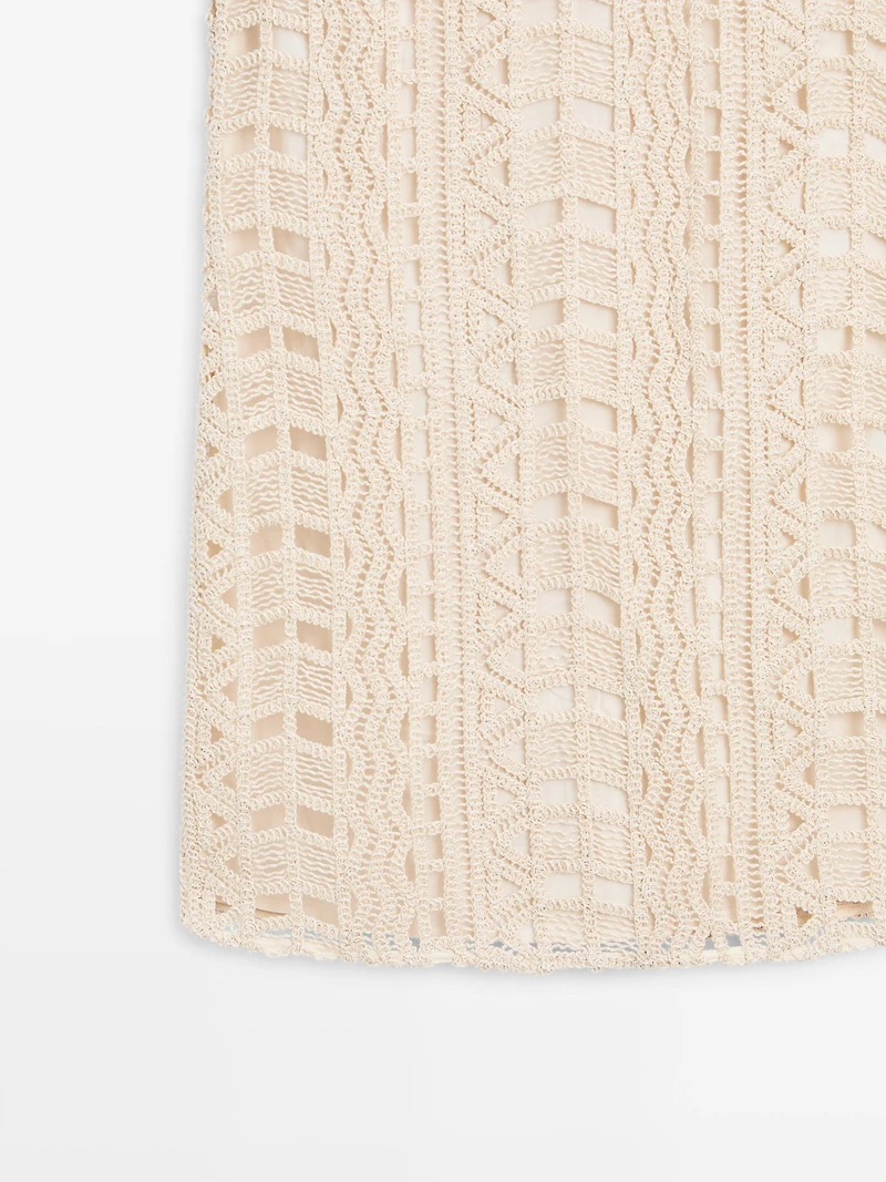 Short openwork dress with metallic detail