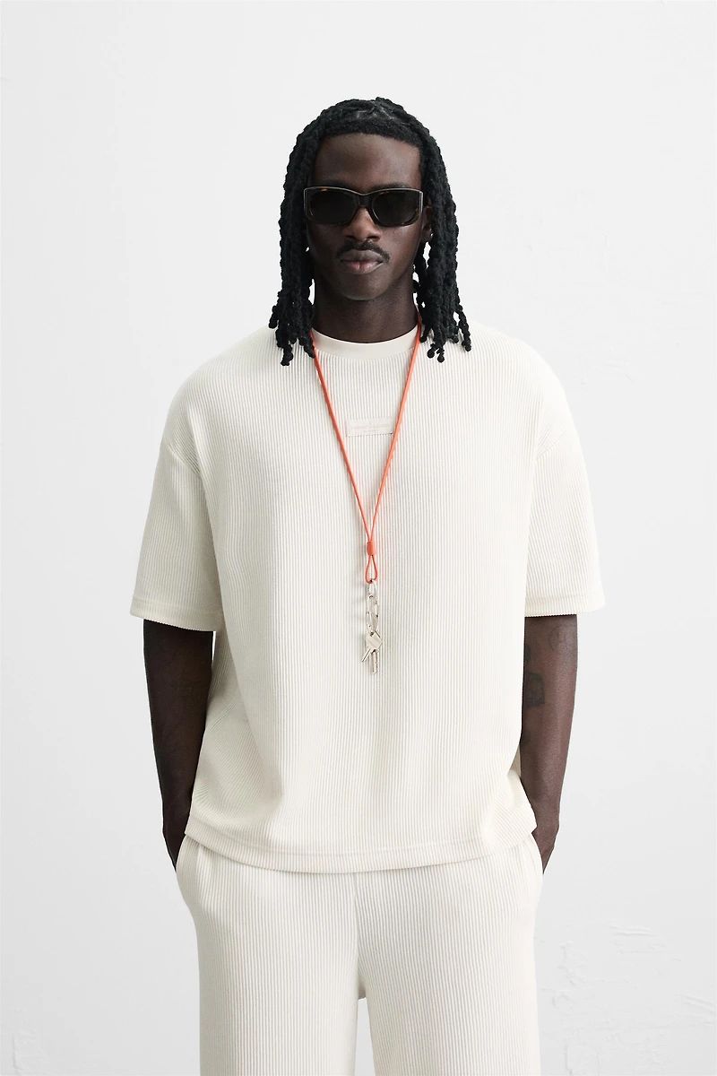T-SHIRT STRUCTURE VERTICALE