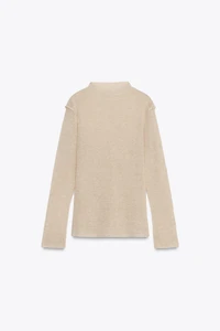 PULL EN MAILLE À COL CHEMINÉE