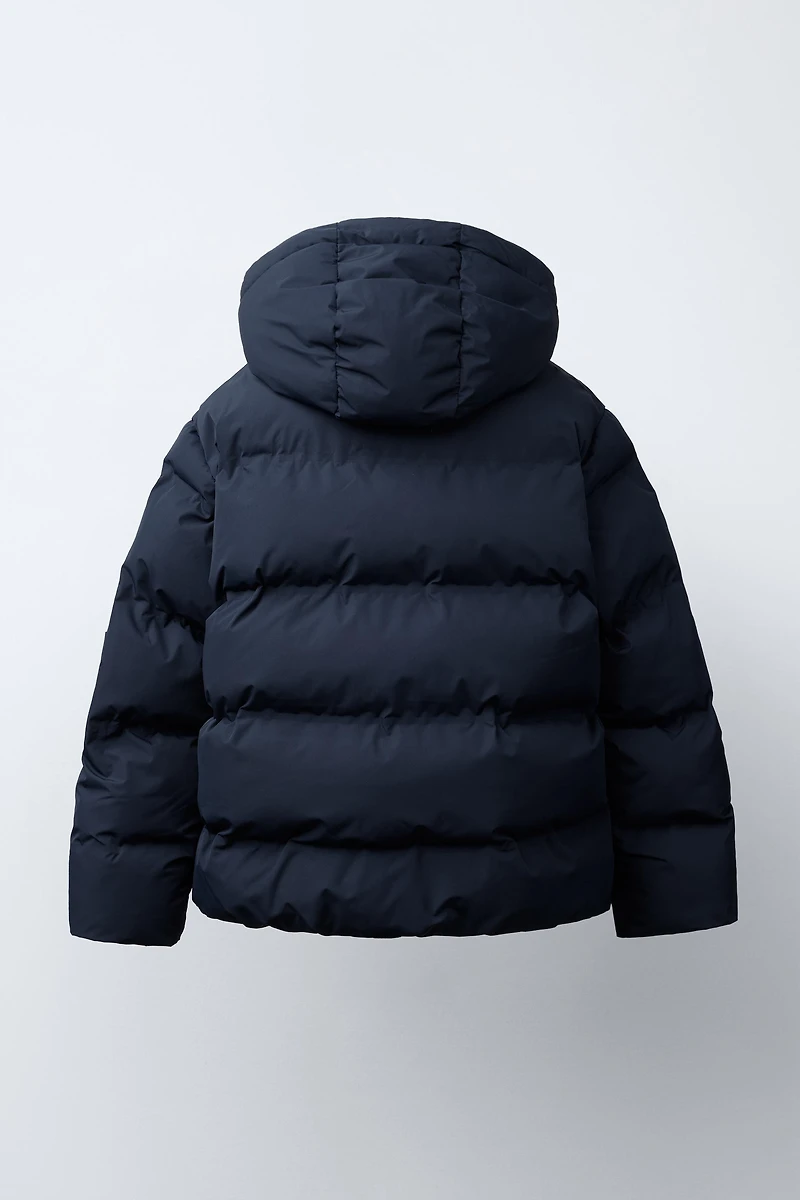 MANTEAU MATELASSÉ ÉTIQUETTE WATER REPELLENT