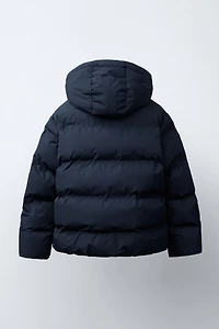 MANTEAU MATELASSÉ ÉTIQUETTE WATER REPELLENT