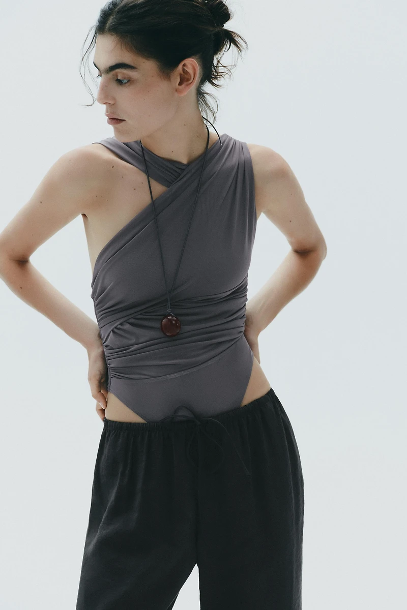 DRAPED ASYMMETRIC TULLE BODYSUIT