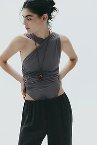 DRAPED ASYMMETRIC TULLE BODYSUIT