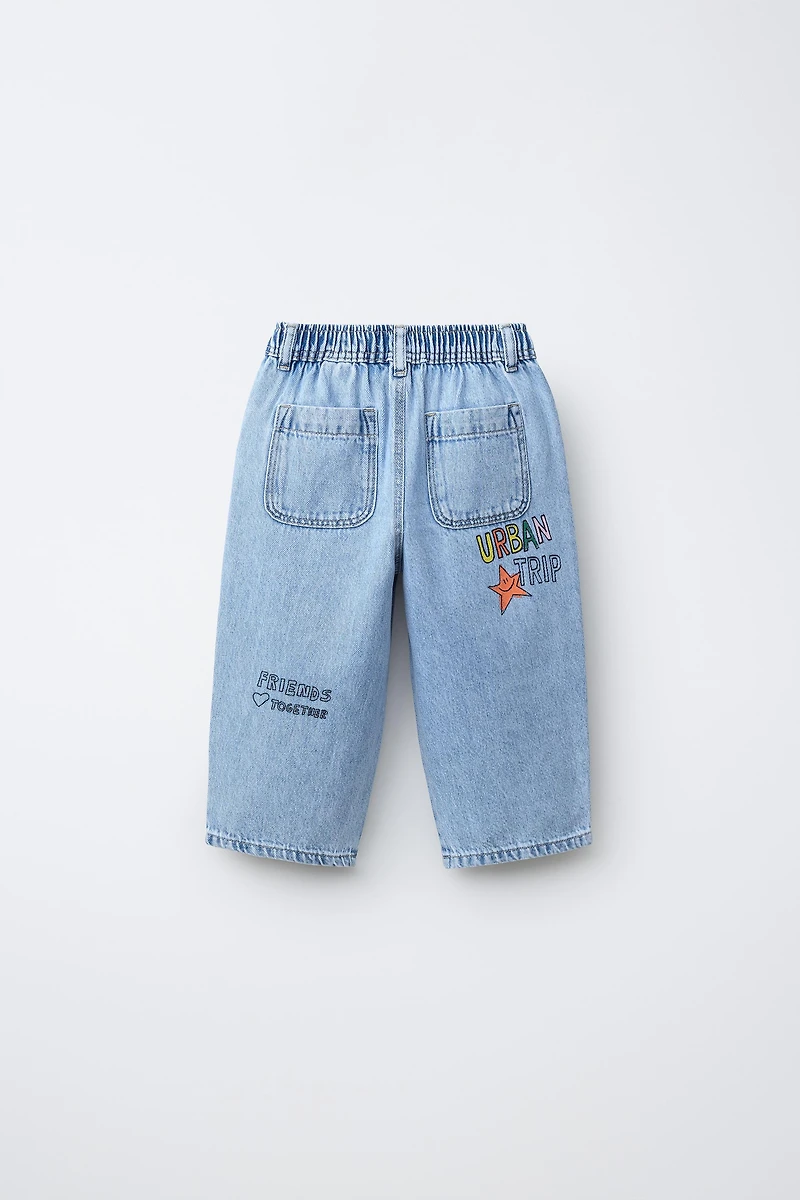 PRINTED TAPERED BAGGY JEANS