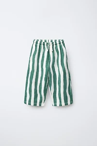 WAVE STRIPED PANTS