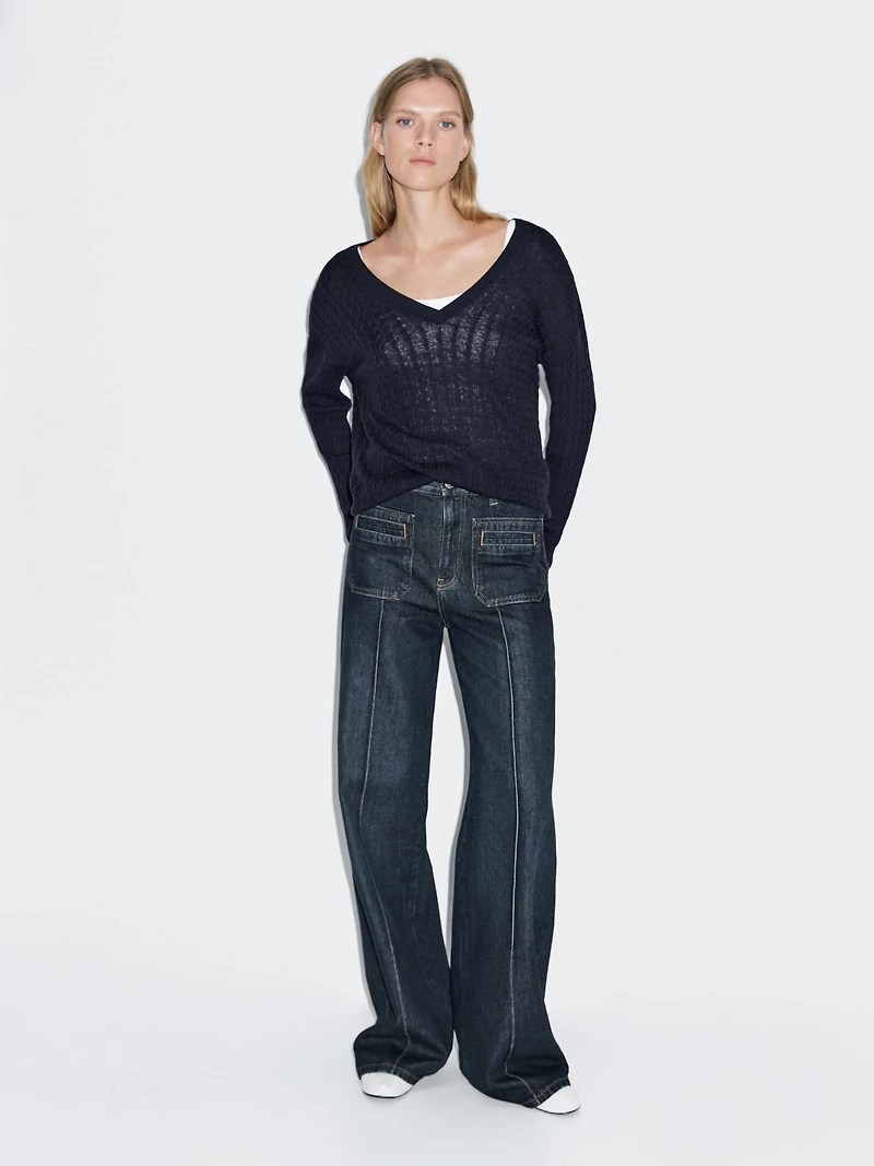 Pull en maille tressée à col V
