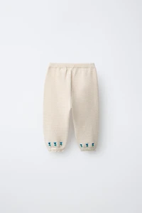 EMBROIDERED FLORAL TEXTURED PANTS WITH LACE TRIM