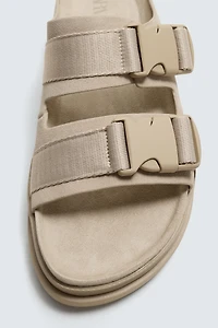 VOLUMINOUS LEATHER SANDALS